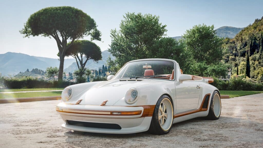 Rendu de face du cabriolet Porsche 911 Singer devant une villa méditerranéenne