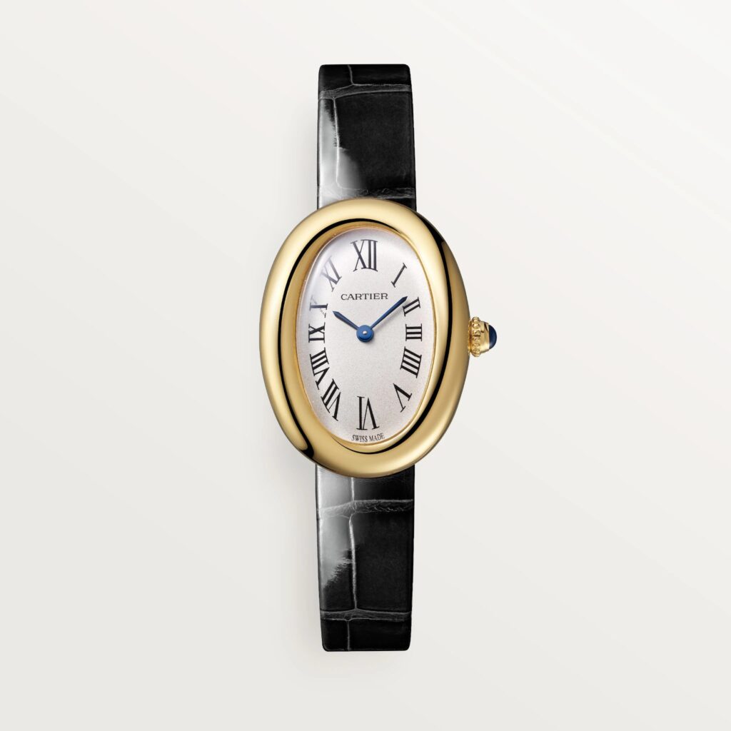 Cartier les plus désirables 2026 : Montre Cartier Baignoire petit modèle en or jaune sur bracelet cuir noir, vue de face
