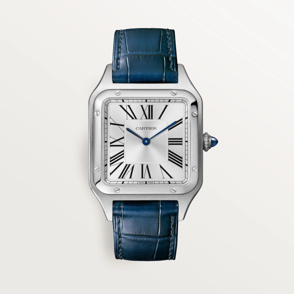 Cartier les plus désirables 2026 : Montre Cartier Santos-Dumont grand modèle en acier sur bracelet cuir bleu, vue de face
