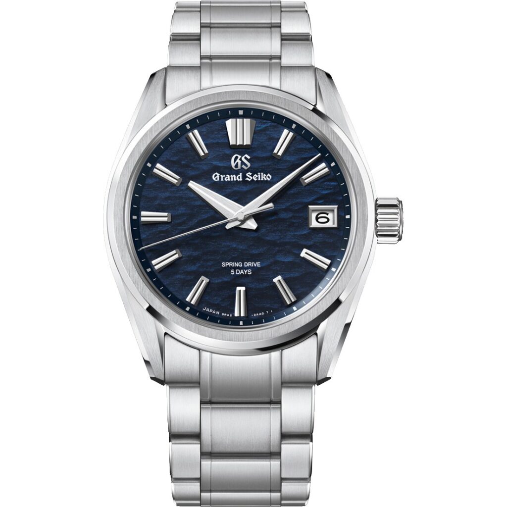 Les 10 Grand Seiko les plus désirables en 2026 : Montre Grand Seiko SLGA021 Lake Suwa en acier, cadran bleu nuit, sur bracelet acier, vue de face