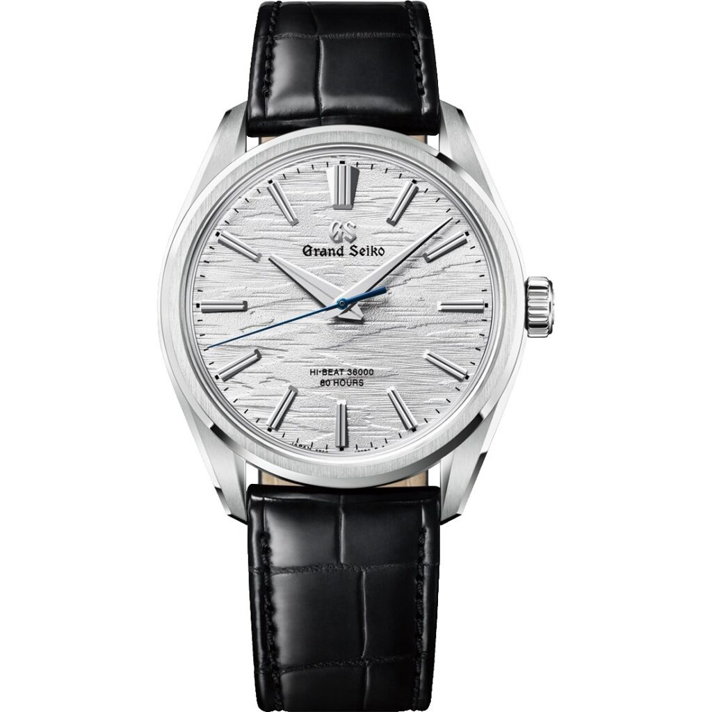 Les 10 Grand Seiko les plus désirables en 2026 : Montre Grand Seiko SLGW003 en acier, cadran blanc texturé, sur cuir noir, vue de face