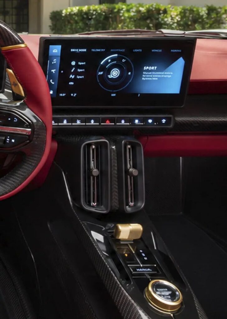 Écran tactile central en mode Sport, aérateurs et sélecteur de l’Aston Martin Valhalla Spider